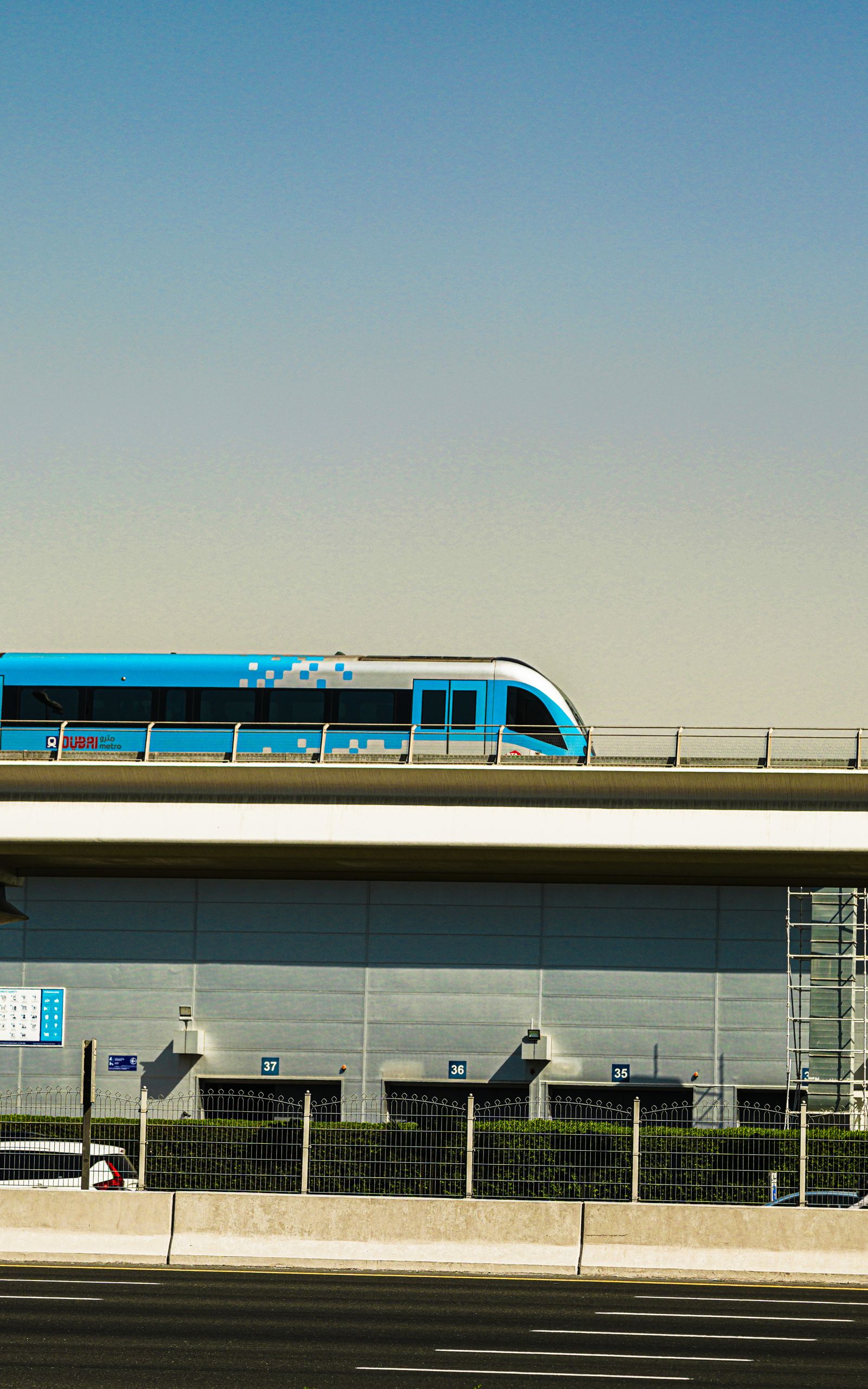 Dubai Metro train travelling on an elevated track